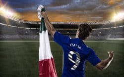 Calciatore con maglia dell'Italia che esulta nello stadio con bandiera italiana